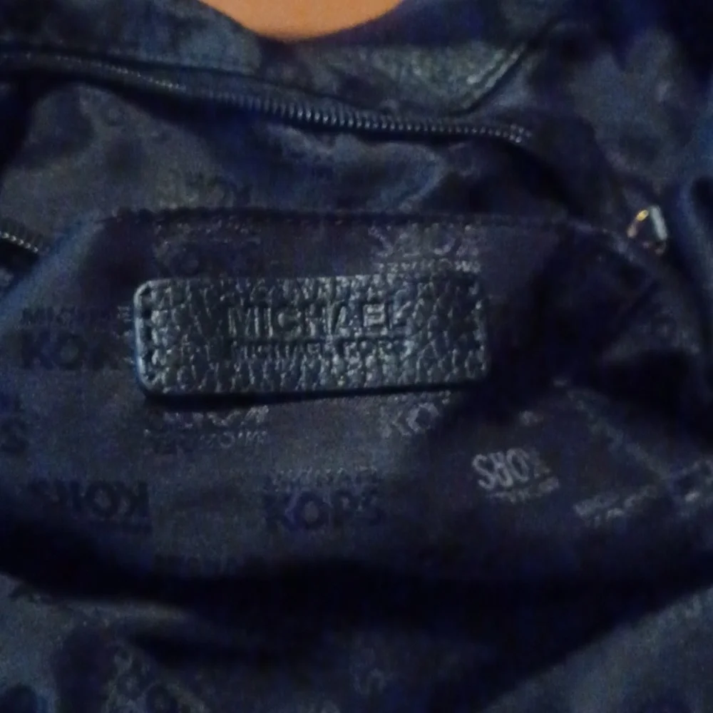 > Michael Kors Elegant Black Women's Bag Charm Tassel